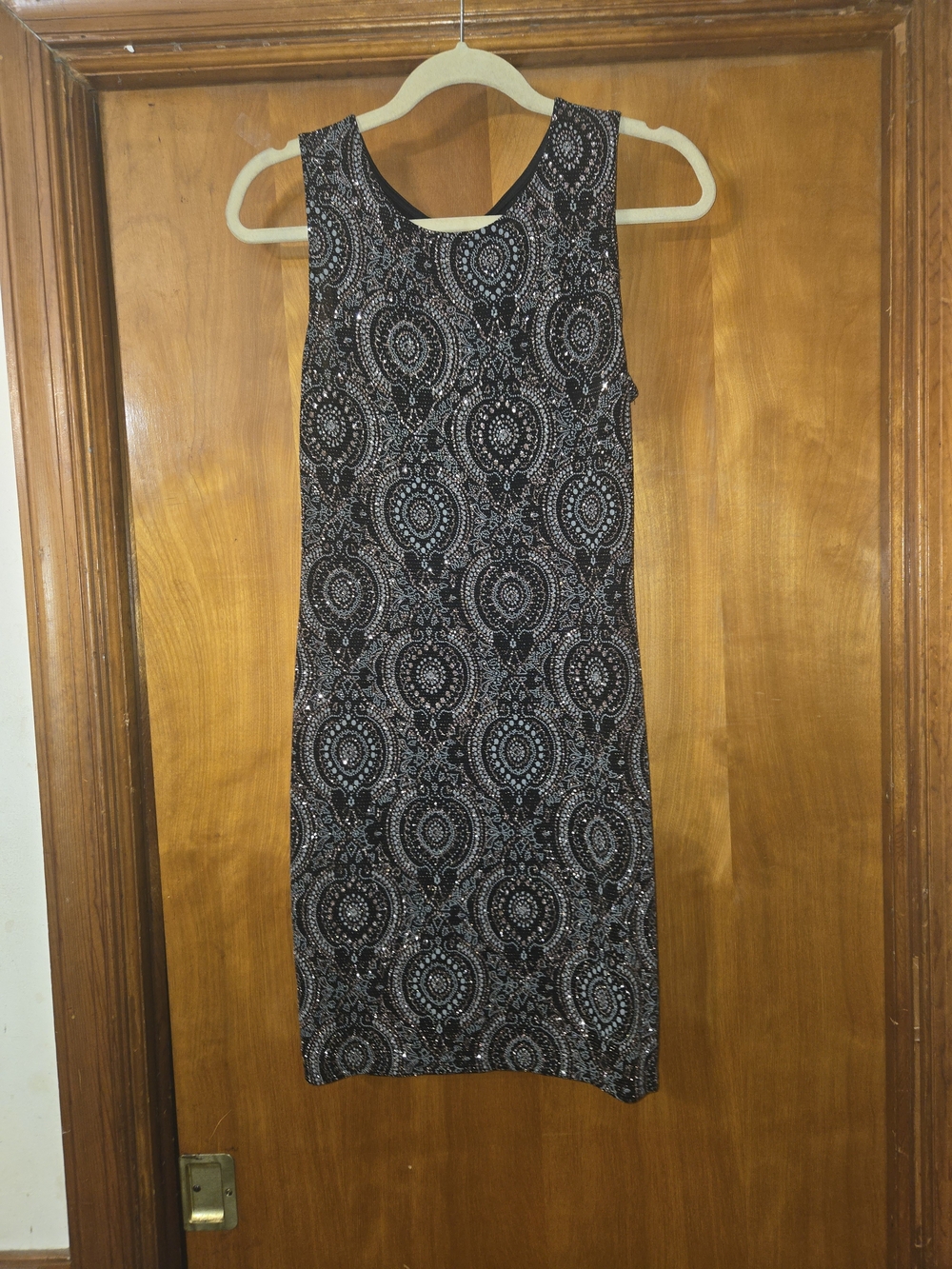 Olivia Matthews Black Dress with Silver Medallion Pattern